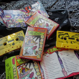 pile of Audio Garbage tapes (in and out of case)