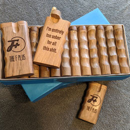 three boxes of F Plus dugouts on a grey blanket