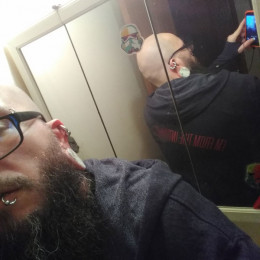 back of the F+ hoodie as shown in a mirror