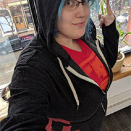 hoodie in an office building, overlooking street