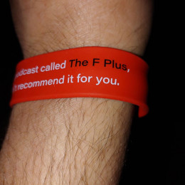 a slap bracelet around another wrist