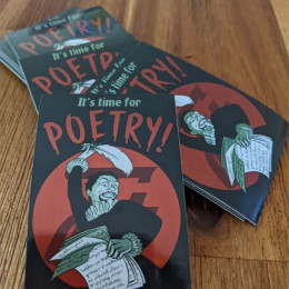 a pile of It's Time For Poetry stickers